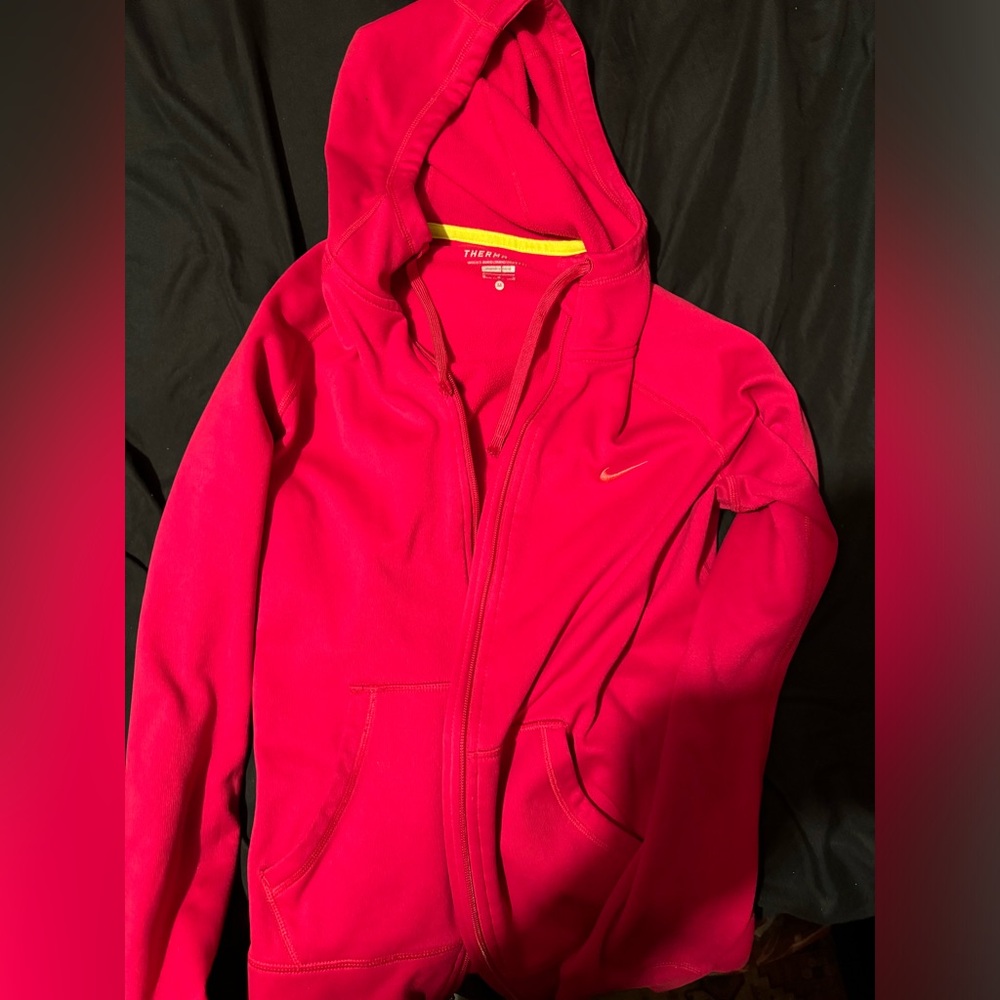 Pink medium women’s Nike zip up sweater